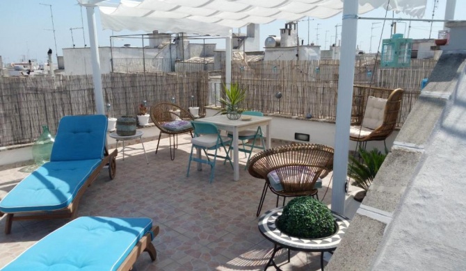 One bedroom house with sea view furnished terrace and wifi at OSTUNI 5 km away from the beach